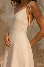 Natural linen a-line mini dress, fabric detail, undyed flax weave in raking light