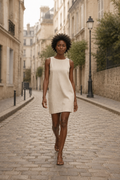 Natural linen shift mini dress, front view, high crew neckline and clean lines