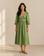 Fern green linen a-line midi dress, straight-on front view for fit reference
