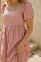 Pink linen a-line mini dress, fabric detail, flax weave in raking light