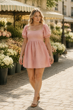 Pink linen a-line mini dress, lifestyle, sunny courtyard, architectural backdrop
