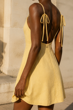 Butter yellow linen a-line mini dress, fabric detail, flax weave in raking light