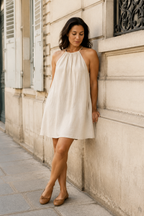 Ivory linen shift mini dress, front view, gathered neckline and thin straps