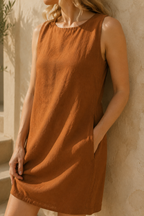 Rust linen shift mini dress, fabric detail, flax weave in raking light