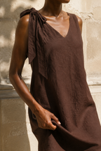 Dark brown linen shift mini dress, fabric detail, flax weave in raking light