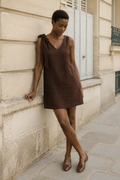 Dark brown linen shift mini dress, front view, tie shoulder V neckline