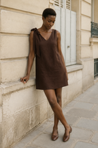 Dark brown linen shift mini dress, front view, tie shoulder V neckline