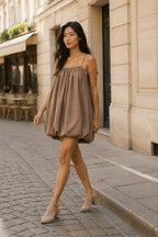 Taupe cotton bubble mini dress, lifestyle, golden hour ease in the city