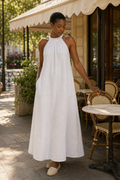 White linen shift mini dress, front view, halter neck and gathered detail