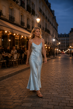 Powder blue silk bias maxi dress, lifestyle, evening street at blue hour
