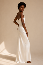 White silk slip maxi dress, three-quarter view, satin luster and drape