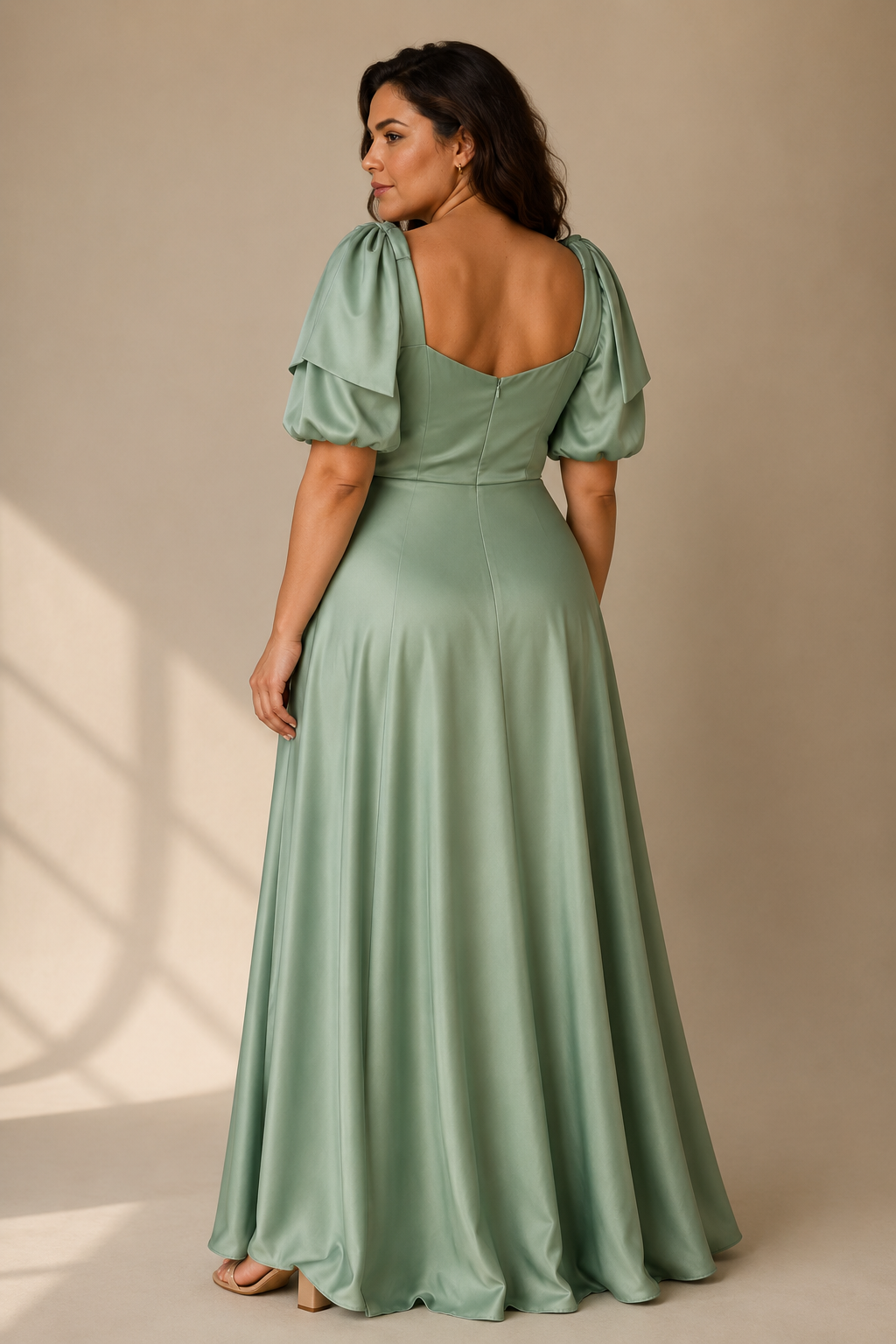 Mint green silk a-line maxi dress, back view, defined waist and soft skirt flow