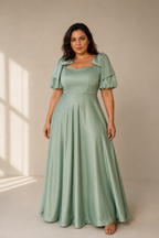 Mint green silk a-line maxi dress, full front view, fitted bodice and flowing A-line skirt
