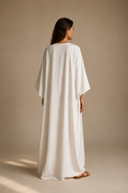 White linen shift maxi dress, back view, fluid silhouette from back