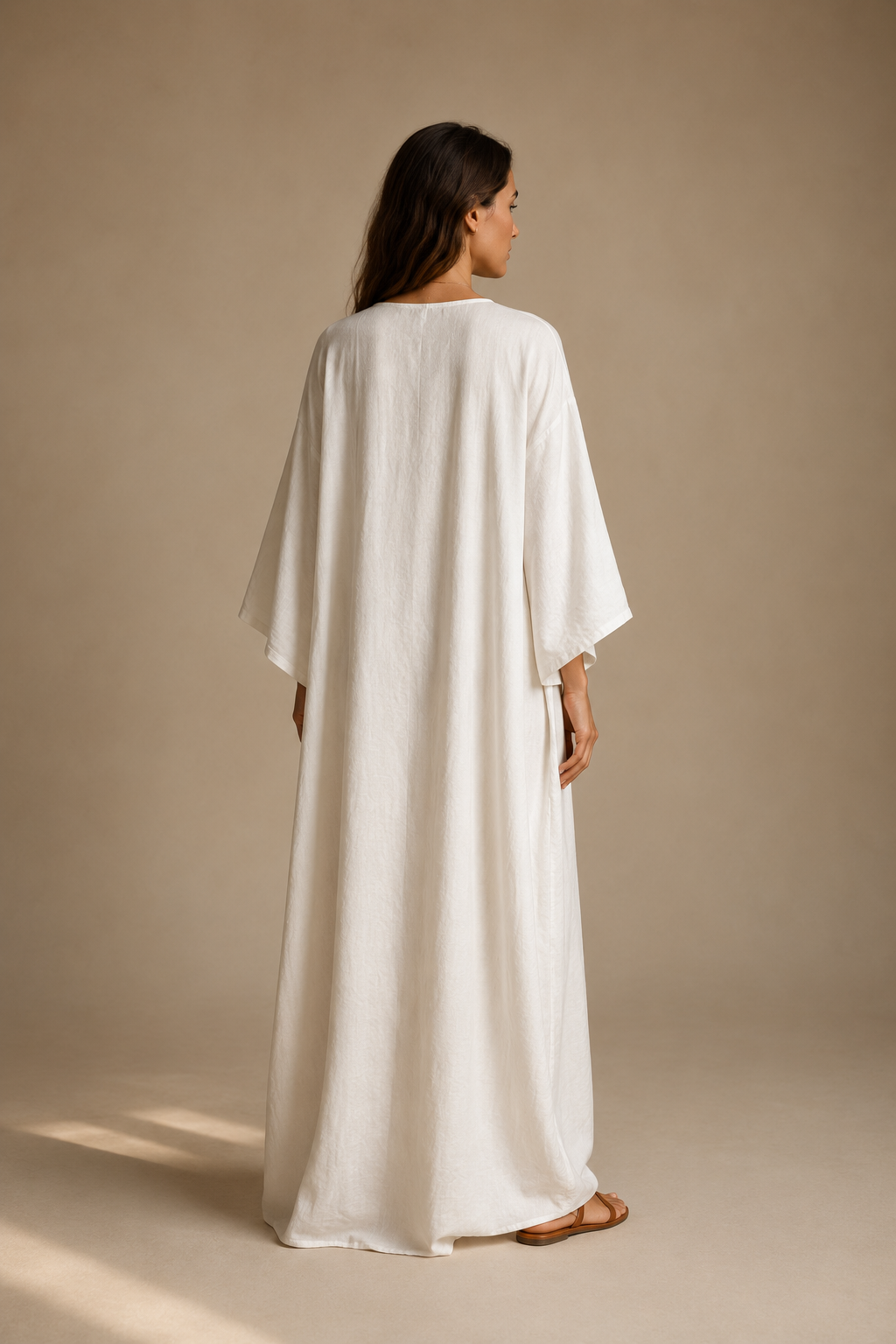 White linen shift maxi dress, back view, fluid silhouette from back