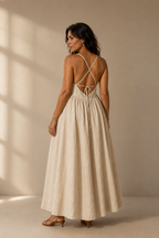 Ivory linen a-line maxi dress, back view, criss-cross back straps, tie closure
