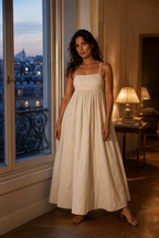 Ivory linen a-line maxi dress, front view, criss-cross back straps and gathered waist