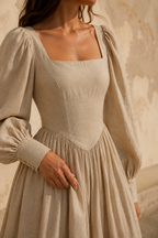 Beige linen a-line maxi dress, fabric detail, flax weave in raking light