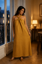 Mustard yellow linen shift maxi dress, front view, twisted halter neck, flowing maxi dress