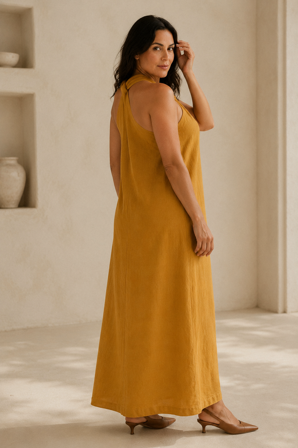 Mustard yellow linen shift maxi dress, three-quarter view, flowy skirt, soft linen drape