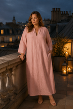 Dusty pink linen shift maxi dress, lifestyle, warm afternoon stroll in a minimalist setting