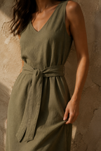 Olive green linen column maxi dress, fabric detail, flax weave in raking light