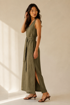Olive green linen column maxi dress, three-quarter view, relaxed fit, tie waist detail, soft drape