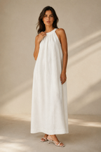 White linen shift maxi dress, full front view, flowing maxi length and gathered detail