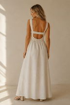 Ivory linen a-line maxi dress, back view, smooth back bodice, flowing skirt