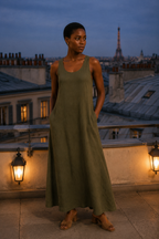 Olive green linen shift maxi dress, lifestyle, walking in warm light