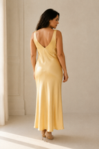 Butter yellow silk slip maxi dress, back view, simple back with subtle drape