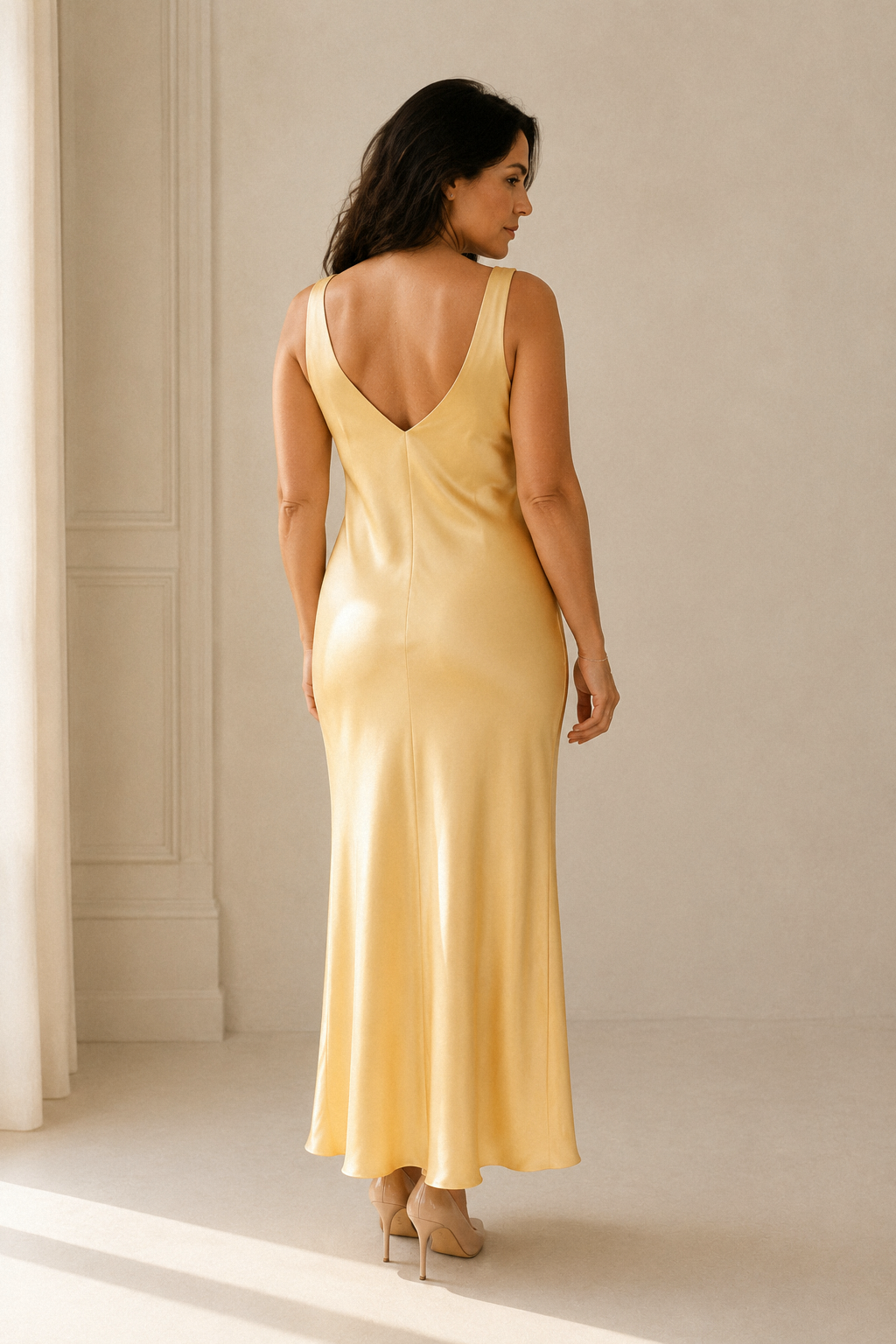 Butter yellow silk slip maxi dress, back view, simple back with subtle drape