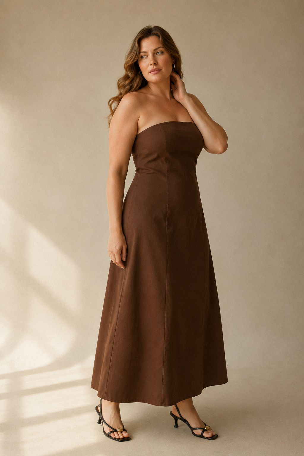 Brown cotton a-line maxi dress, three-quarter view, maxi length and relaxed silhouette
