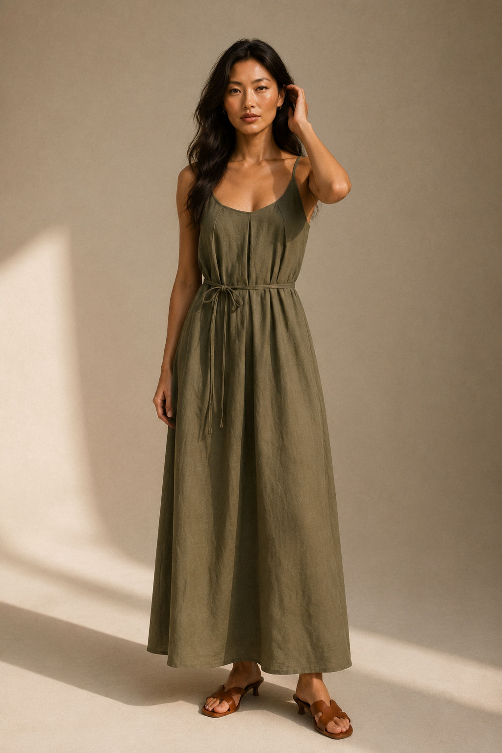 Olive green linen slip maxi dress, full front view, relaxed maxi silhouette with tie waist