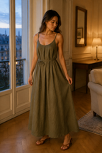 Olive green linen slip maxi dress, front view, scoop neckline and tie waist