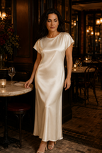 Ivory silk column maxi dress, lifestyle, city stroll with coffee
