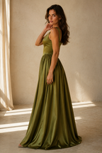Olive green silk a-line maxi dress, three-quarter view, flowing silk fabric, defined waist
