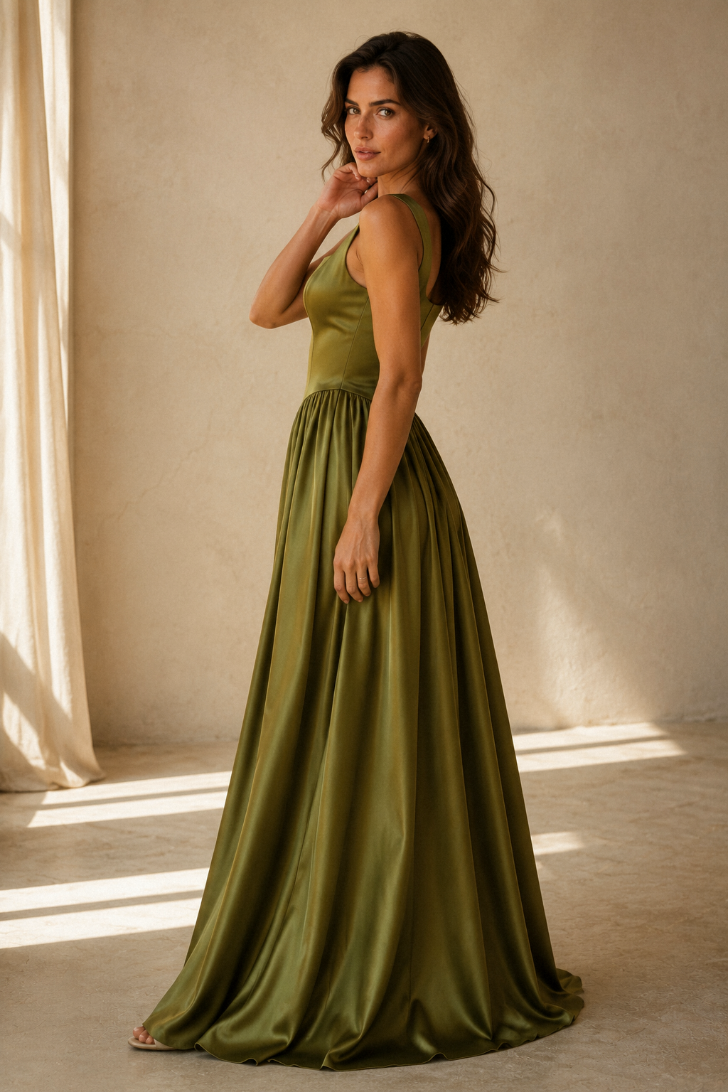 Olive green silk a-line maxi dress, three-quarter view, flowing silk fabric, defined waist