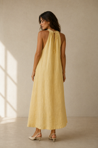 Butter yellow linen shift maxi dress, back view, smooth back and halter neck detail