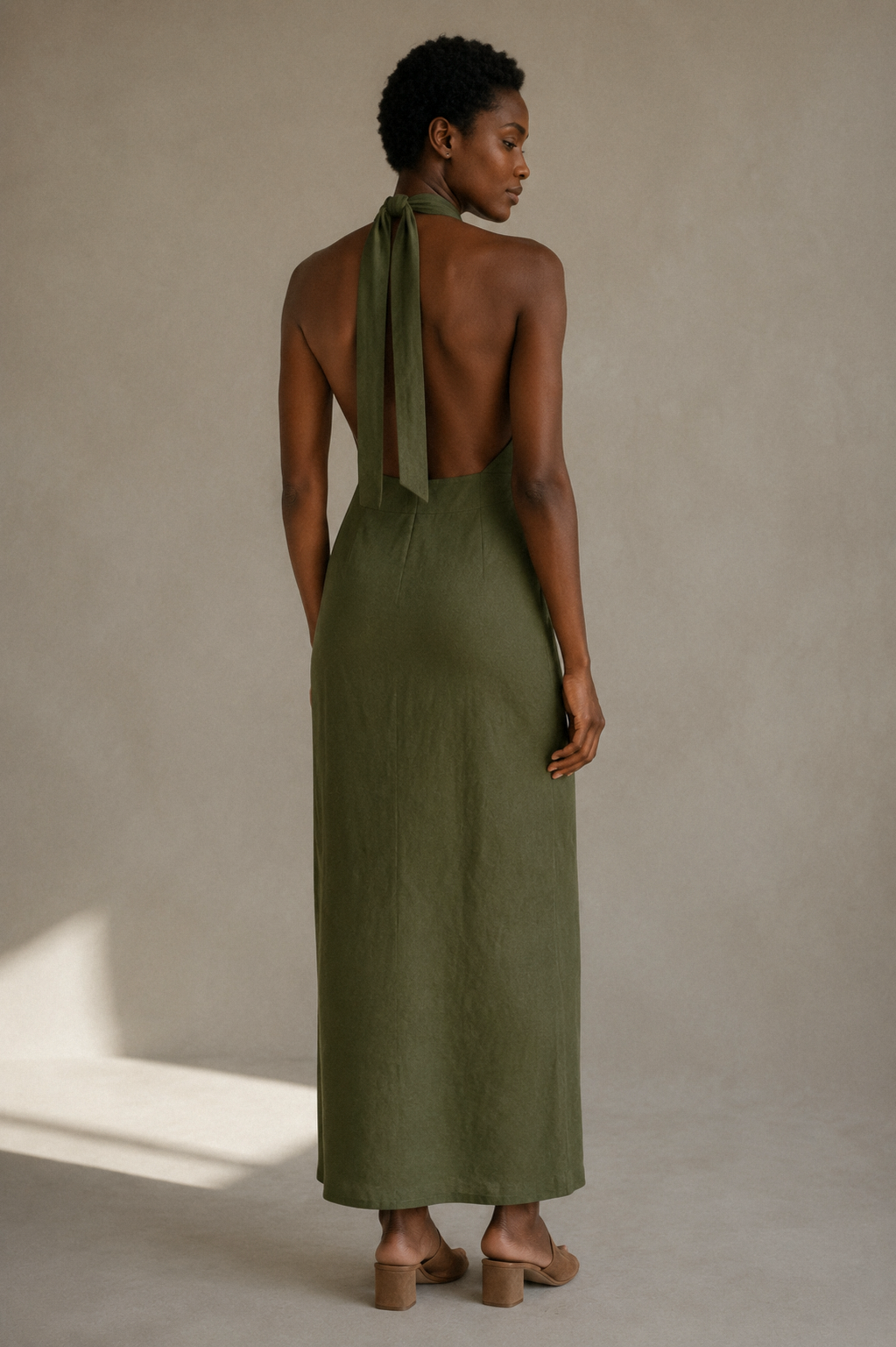 Olive green linen column maxi dress, back view, unseen back with a graceful line