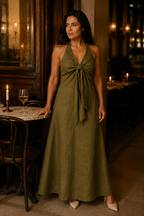 Olive green linen a-line maxi dress, lifestyle, afternoon light, soft shadows