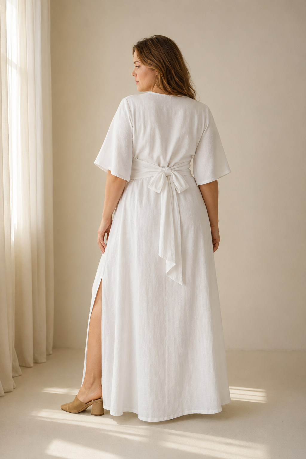 White linen wrap maxi dress, back view, flowing skirt with ease
