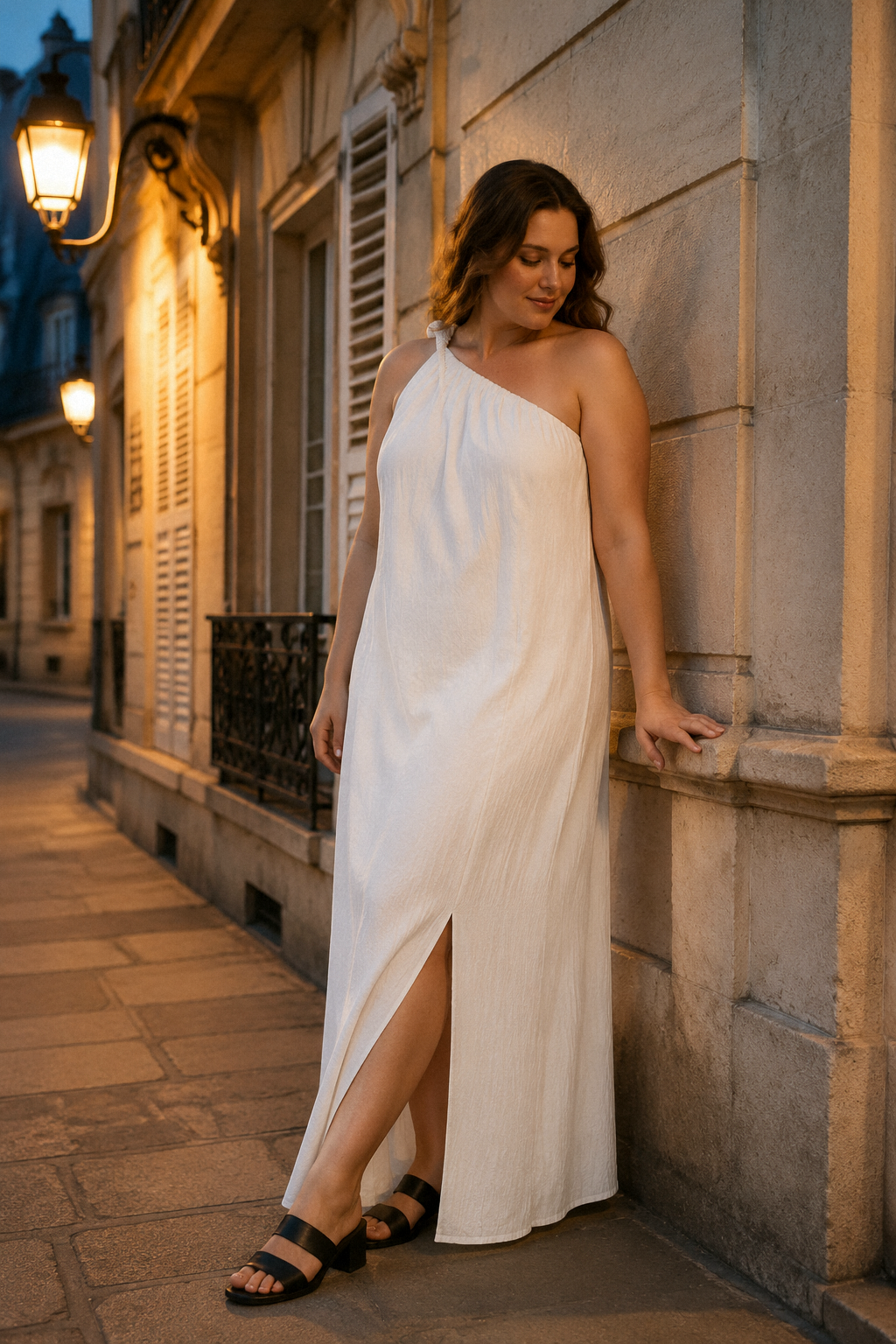 White linen shift maxi dress, front view, one-shoulder design, flowing silhouette, side slit