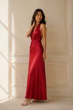 Red silk column maxi dress, three-quarter view, draped bodice and smooth fabric