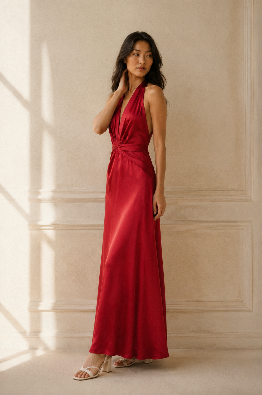 Red silk column maxi dress, three-quarter view, draped bodice and smooth fabric