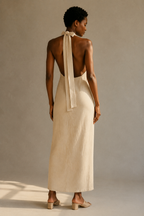 Beige linen column maxi dress, back view, halter tie and open back