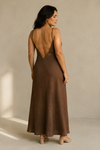 Brown linen slip maxi dress, back view, simple lines, understated elegance