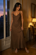 Brown linen slip maxi dress, front view, V neckline, thin straps, flowing skirt