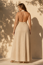 Beige linen a-line maxi dress, back view, halter straps, smooth back, gentle skirt release