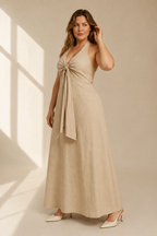 Beige linen a-line maxi dress, three-quarter view, fabric drape, subtle texture, A-line flow